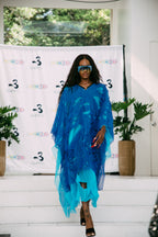 Zerfetzter blauer Kaftan